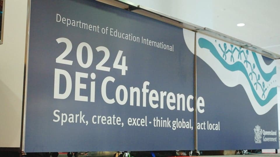 Still from a Department of Education International conference wrap edit.